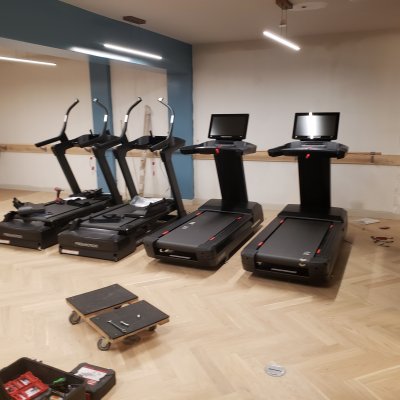 row of different exercise equipment